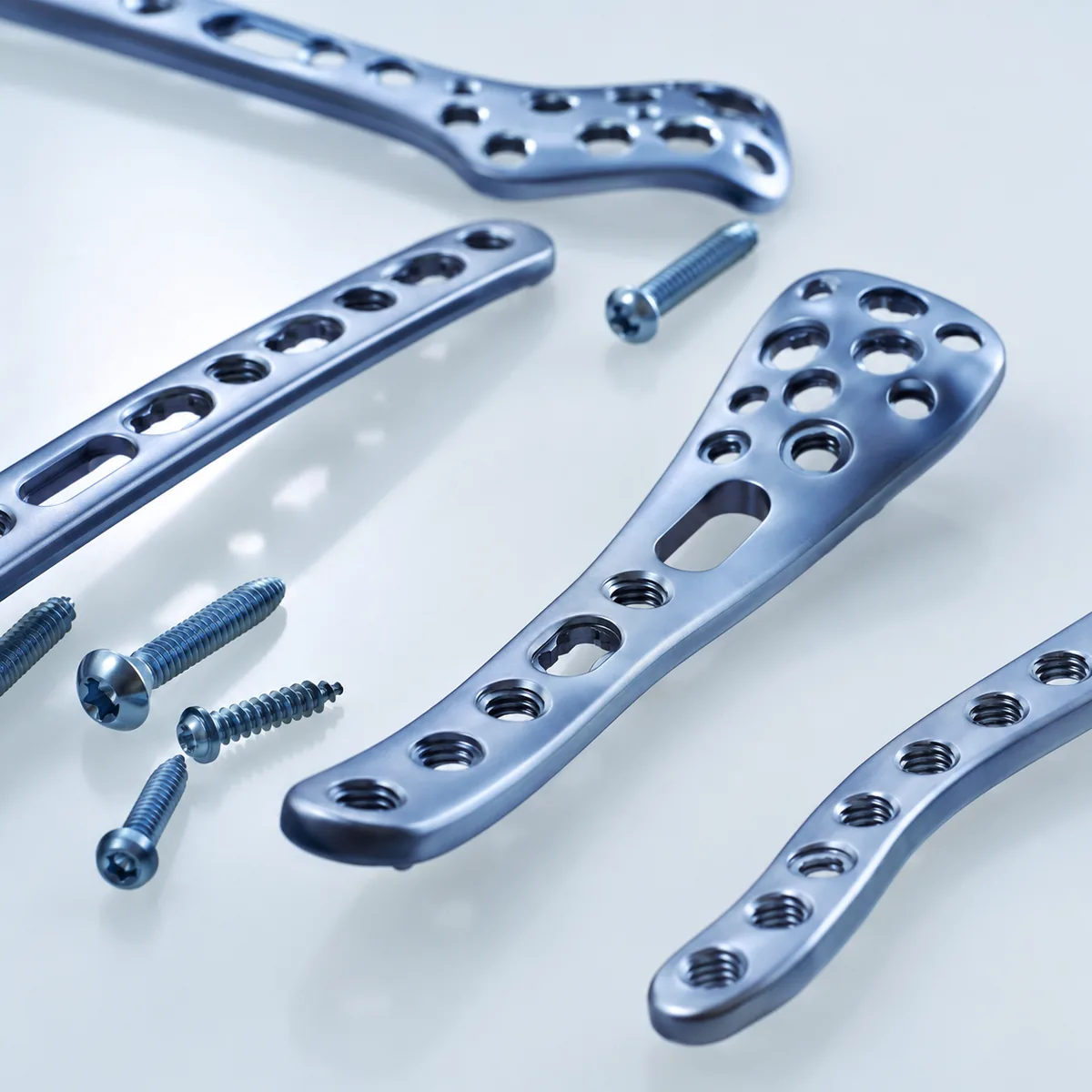 Titanium orthopedic plates and screws for trauma